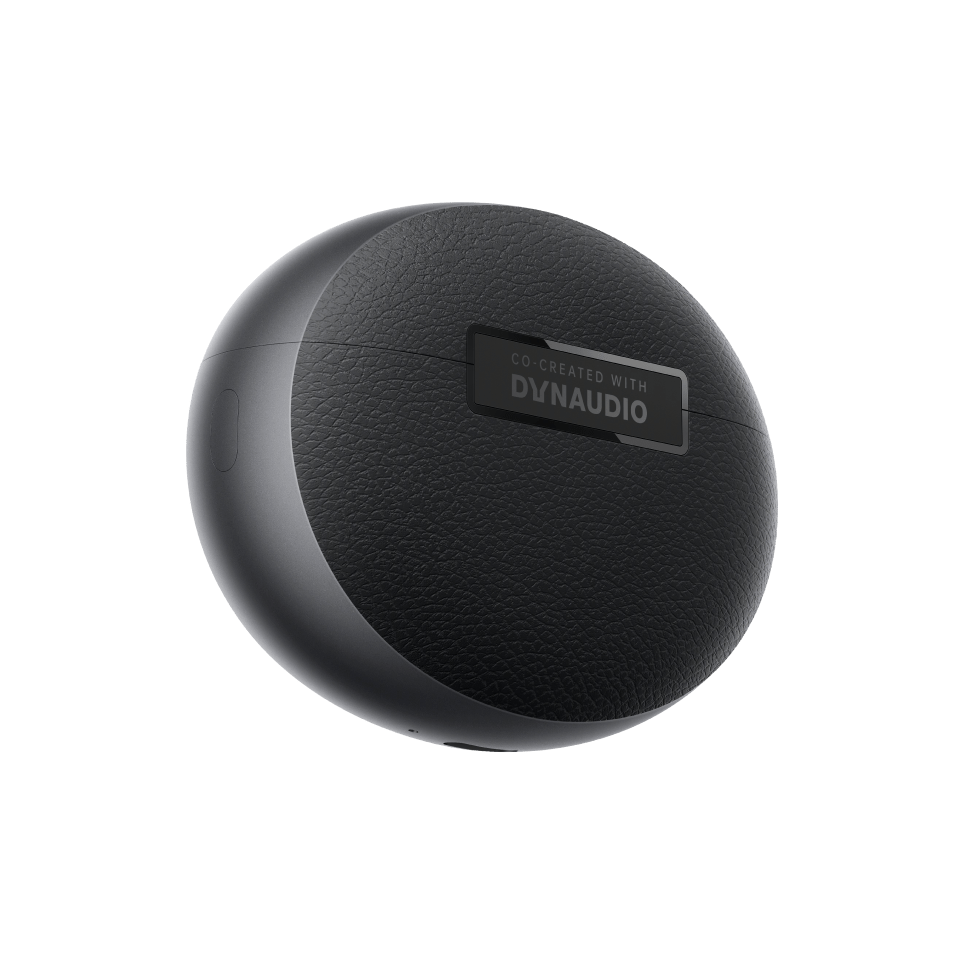 Black spherical speaker with Dynaudio logo